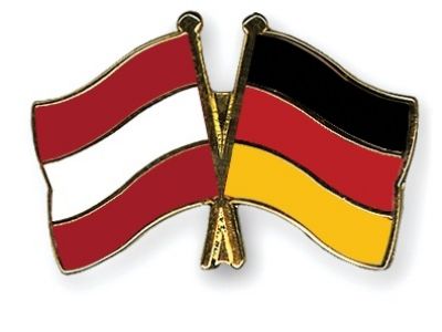 Флаги Австрии и Германии. Источник - crossed-flag-pins.com